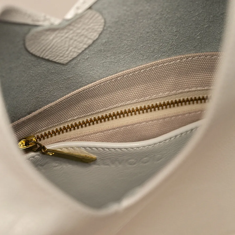 Patent Off-White Mocha Nexus Handbag
